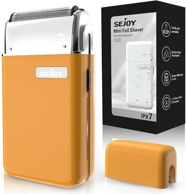an image of an orange electric shaver next to a box