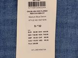 the label on the back of a pair of blue jeans