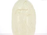 a white vase with a picture of a man and a dog on it