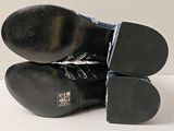 a pair of shoes that are sitting on top of each other