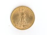 an image of a gold coin on a white surface