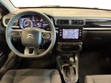 the interior of a car with a steering wheel, dashboard, and dash board