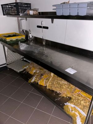an image of a kitchen with a sink and a counter