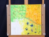 a picture of an easel with a painting on it