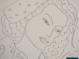 an image of a drawing of a woman ' s face with curly hair