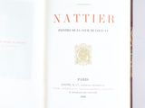 a book opened to show the title of a novel