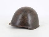 a close up of a helmet on a white surface