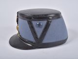 a blue hat with a black visor on a white background