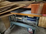 a picture of a workbench that has a lot of wood on it