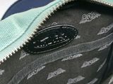 a close up of a purse with a zipper on it