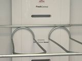 a white refrigerator with a freezer inside of it