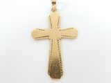 a gold cross pendant on a white background