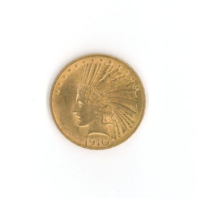 une image représentant une pièce d'or sur laquelle figure une tête d'Indien