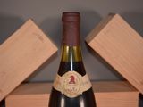 a bottle of wine that is sitting on a table