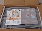 a cardboard box that has a bunch of items inside of it