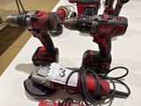 three tools that are sitting on top of a table