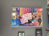 a video game on the table next to a game case