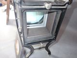an old television sitting on a stand in a room