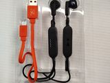 two ear buds and a usb cable in the package