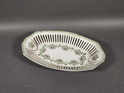 a close up of a plate on a table with a black background