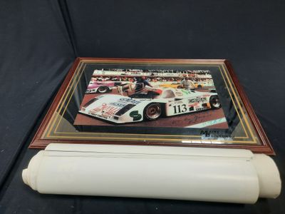 a close up of a picture of a race car in a frame