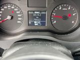a close up of a car dashboard with a speedometer and gauges