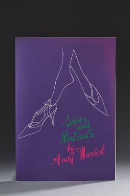 the cover of a purple book with a drawing of a pair of shoes