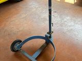 an image of a small table on wheels in a garage