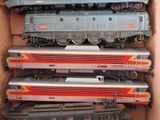 a lot of trains that are in a box together
