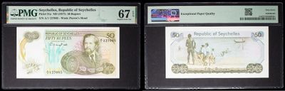 three different types of currency are on display in a display case