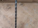 a close up of a drill on a box