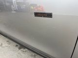 a sticker on the door of a car that has a sticker on it