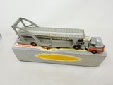 a toy truck that is sitting on top of a box