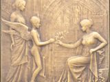 une image représentant une plaque en bronze sur laquelle figurent une femme et un homme se tenant la main