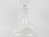 clear glass decanter on white background with white background