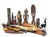 many different types of carved items on the table