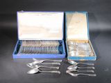a box of silverware with spoons and spoons in it