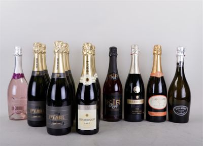 several bottles of wine are lined up in a row on a table