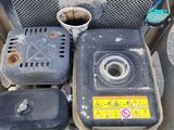 a small machine that is sitting on the ground