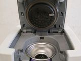 a dog bowl in the middle of a washer