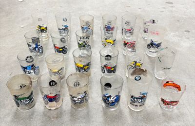 a lot of glasses that are sitting on the floor