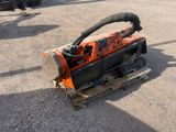 a machine that is sitting on a pallet in the dirt