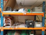 a shelf full of assorted items in a room