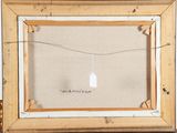 an image of a picture frame with a tag hanging from it