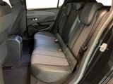 the back seats of a car with a seat belt in the back of it