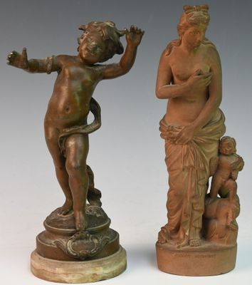 pair of antique bronze figurines of a boy and a girl