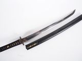 two samurai swords on a white surface with a white background