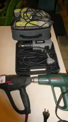 a picture of a corded hot glue gun and a corded hot glue gun on a table