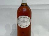 a bottle of whiskey that is sitting on a table