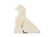 a white sculpture of a cat on a white background